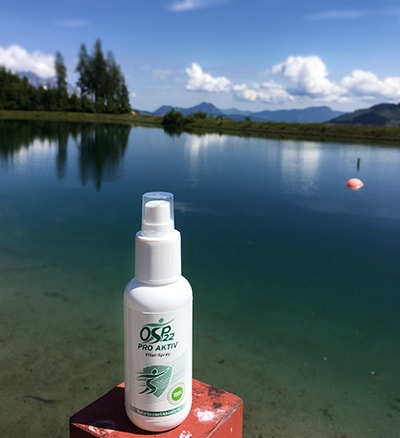 OSP22 Pro Aktiv im Hintergrund ein See und Berge